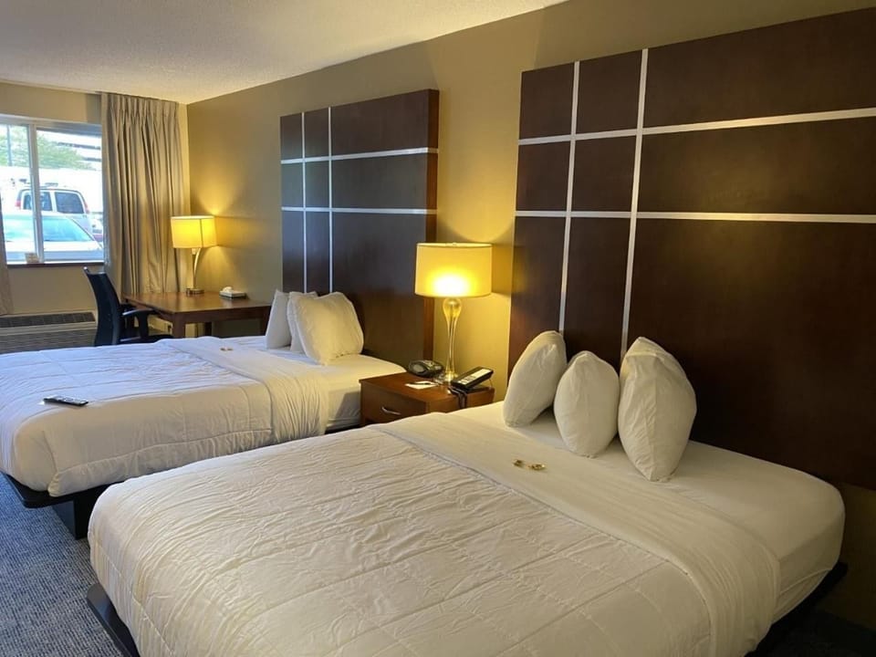 Premium bedding, pillowtop beds, blackout drapes, iron/ironing board
