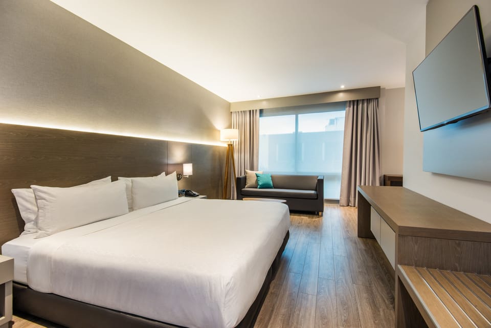 Suite, 1 King Bed | Minibar, in-room safe, desk, laptop workspace