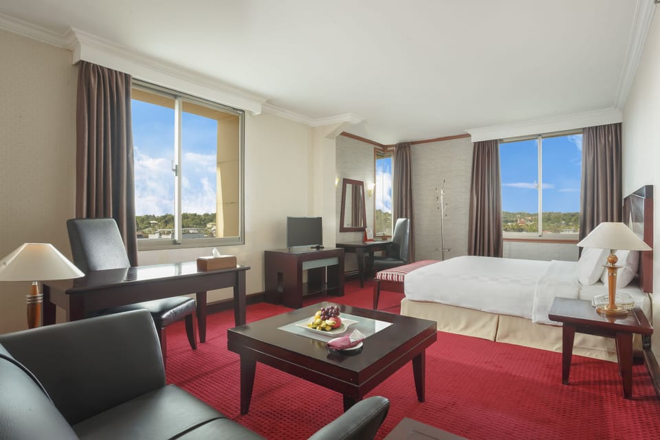 Premium bedding, down comforters, minibar, in-room safe