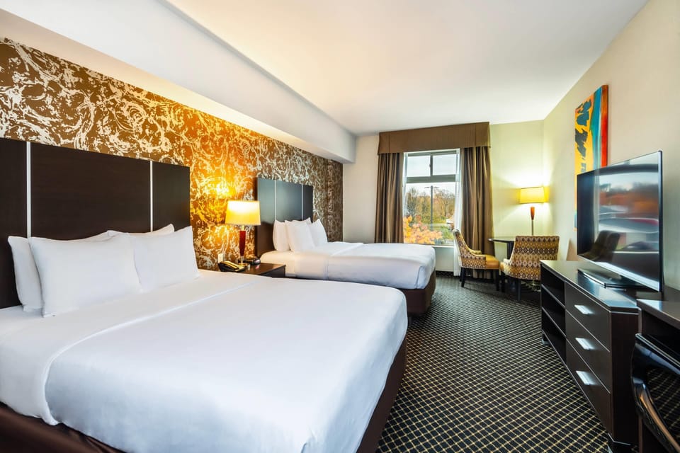 Standard Room, 2 Queen Beds, Non Smoking | Pillowtop beds, laptop workspace, blackout drapes, iron/ironing board