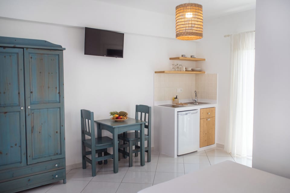 Studio, 1 Double Bed, Balcony | Living area | 15-inch flat-screen TV with satellite channels, TV