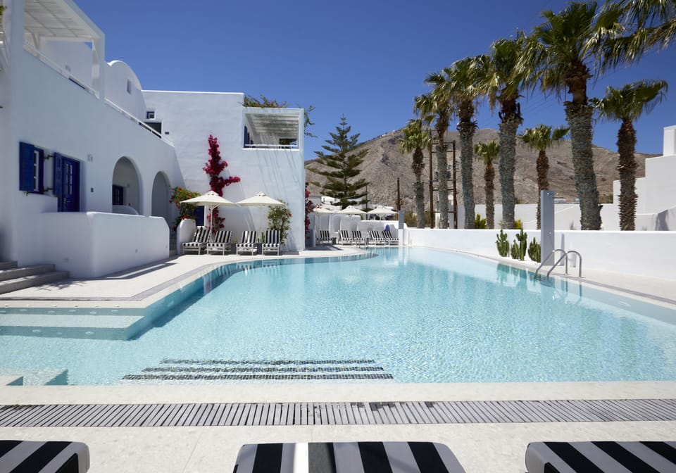 Seasonal outdoor pool, open 8 AM to 8 PM, free cabanas, pool umbrellas