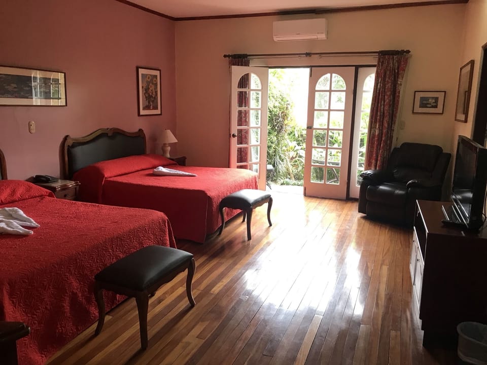 Deluxe Single Room, 2 Queen Beds, Patio, Garden View | Premium bedding, down comforters, in-room safe, individually furnished