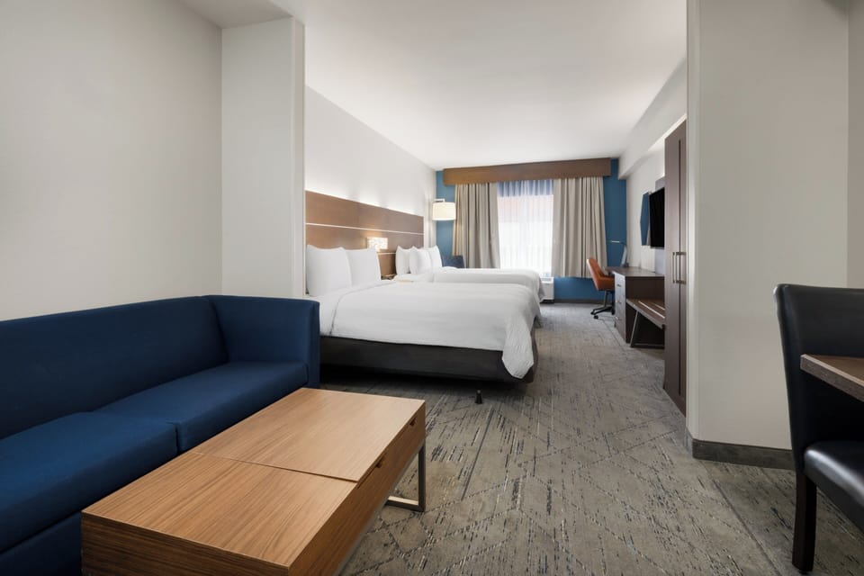 In-room safe, desk, iron/ironing board, free cribs/infant beds