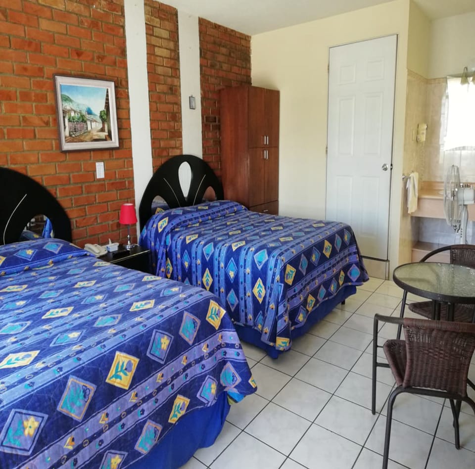 Classic Double Room, 2 Double Beds, Non Smoking, Private Bathroom | Laptop workspace, iron/ironing board (on request), cribs (free)
