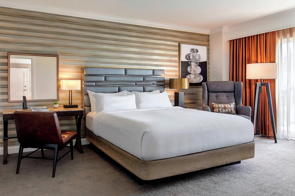 Premium bedding, down comforters, pillowtop beds, in-room safe