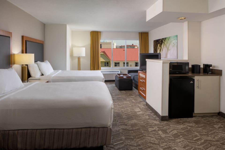Suite, Multiple Beds | Down comforters, pillowtop beds, desk, blackout drapes