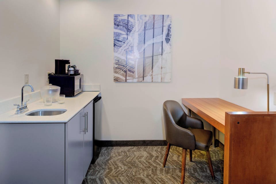 Pillowtop beds, desk, laptop workspace, blackout drapes