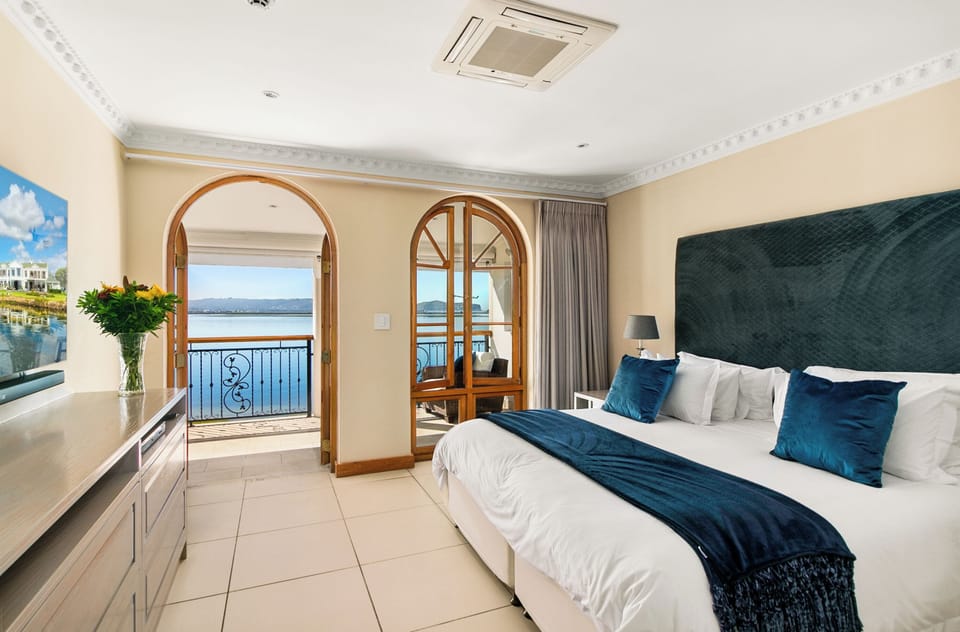 Executive Penthouse, 1 King Bed, Lagoon View | Hypo-allergenic bedding, minibar, in-room safe, individually decorated
