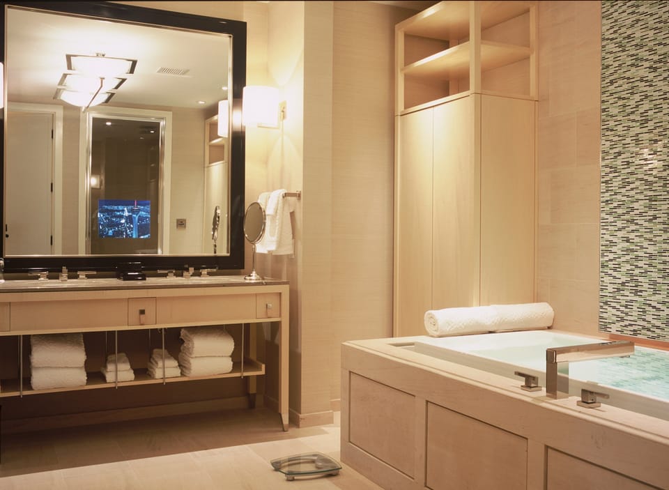 Separate tub and shower, jetted tub, designer toiletries, hair dryer