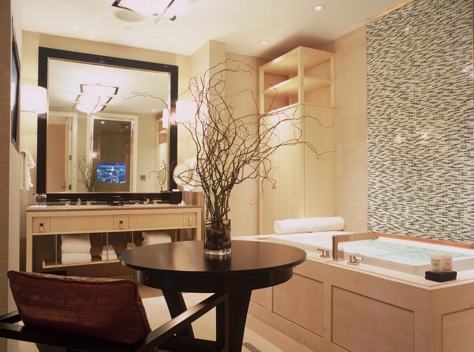 Separate tub and shower, jetted tub, designer toiletries, hair dryer
