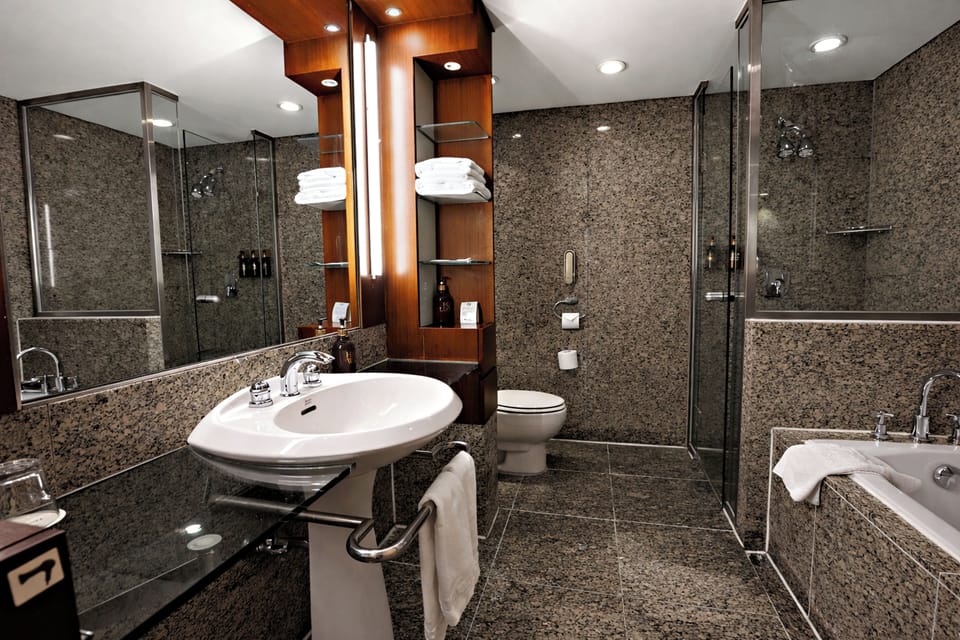 Hair dryer, bathrobes, slippers, towels