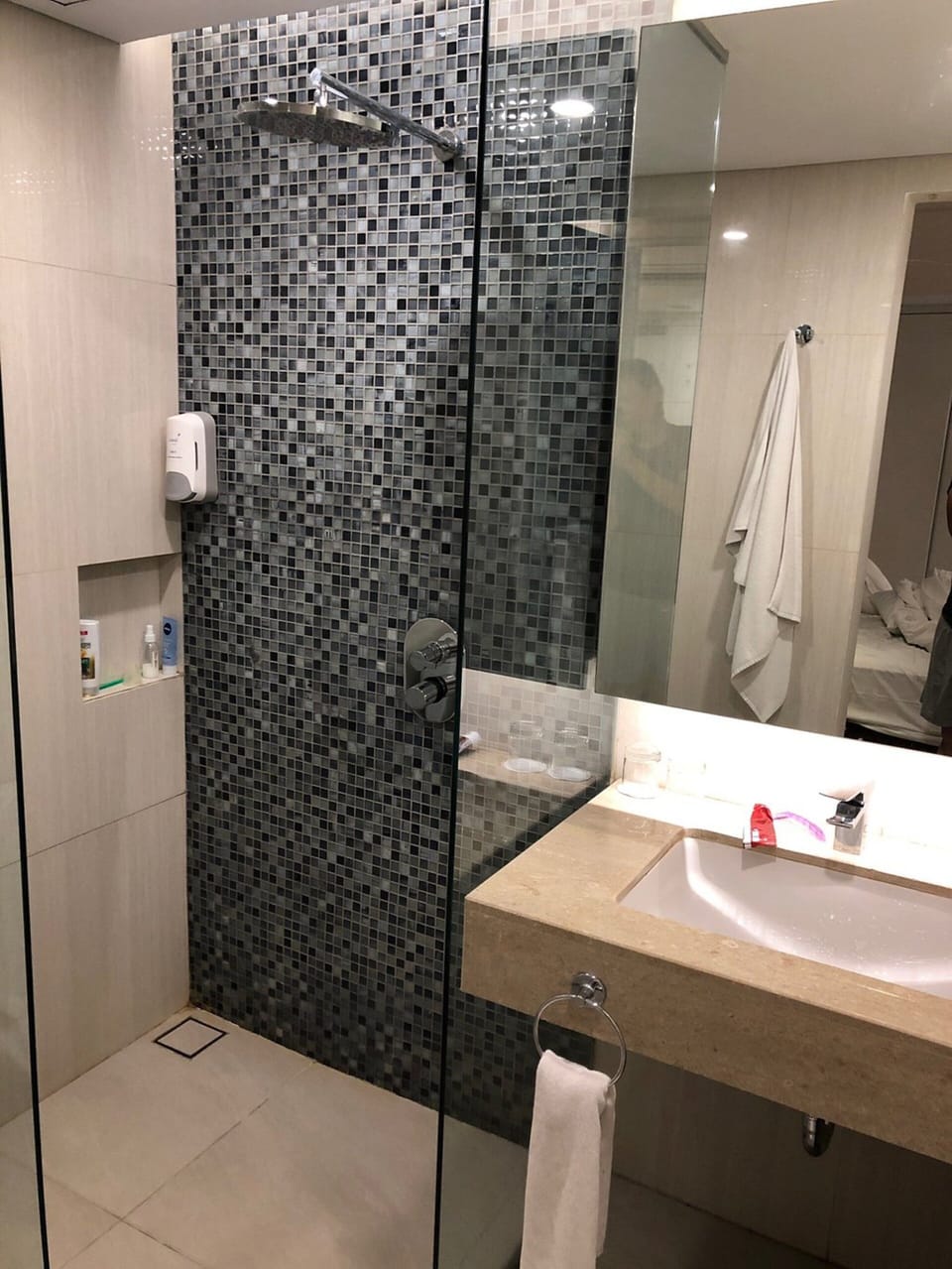 Shower, free toiletries, slippers, towels