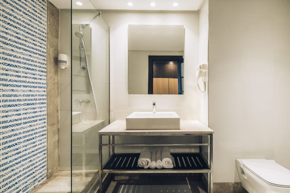 Double Room, Garden View | Bathroom | Shower, eco-friendly toiletries, hair dryer, bathrobes