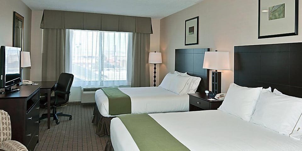 Hypo-allergenic bedding available, in-room safe, desk, laptop workspace