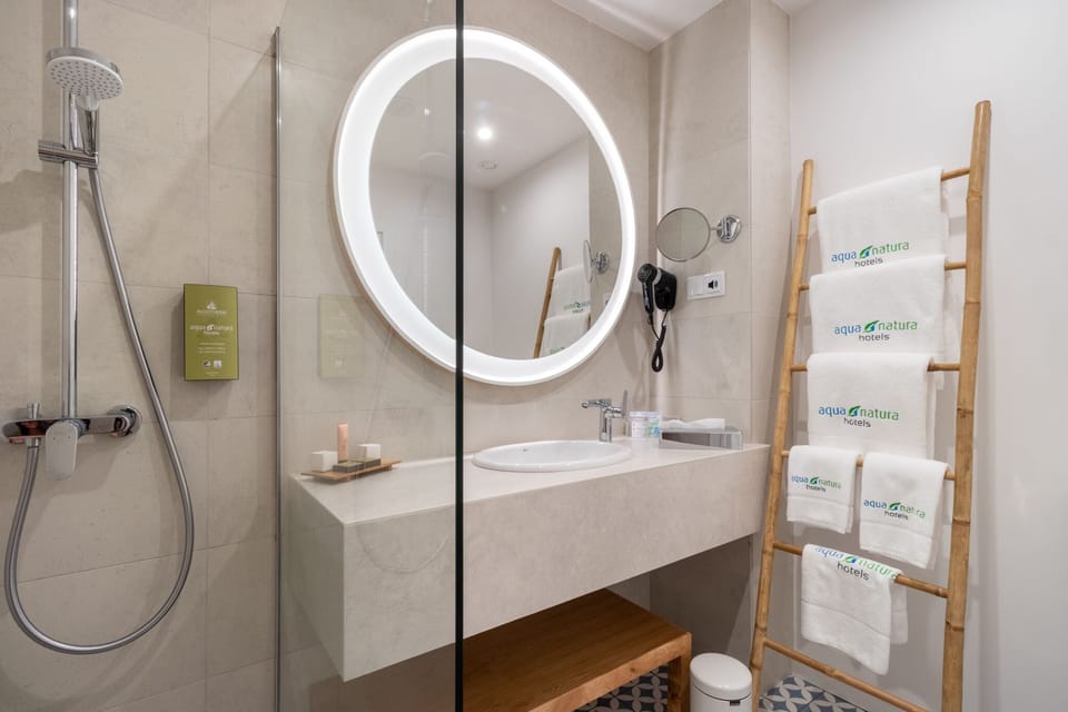 Hair dryer, bathrobes, slippers, towels