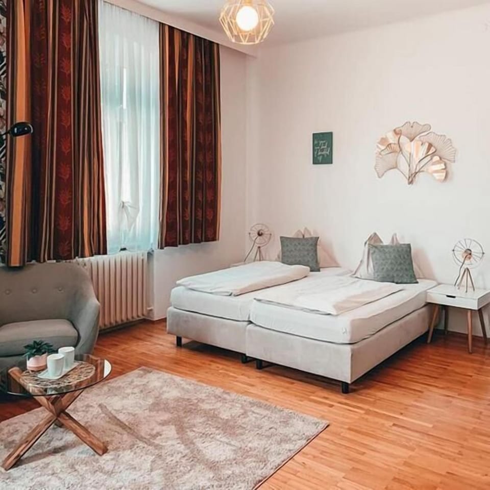 Family Apartment, 1 Bedroom, Non Smoking | Hypo-allergenic bedding, desk, iron/ironing board, free WiFi
