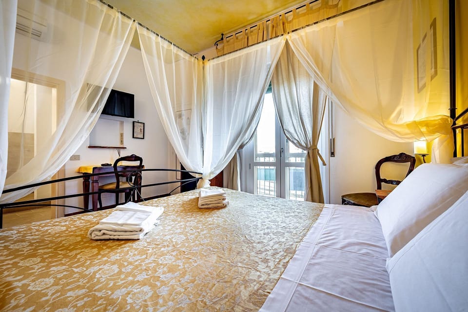 Double Room | Memory foam beds, minibar, blackout drapes, iron/ironing board