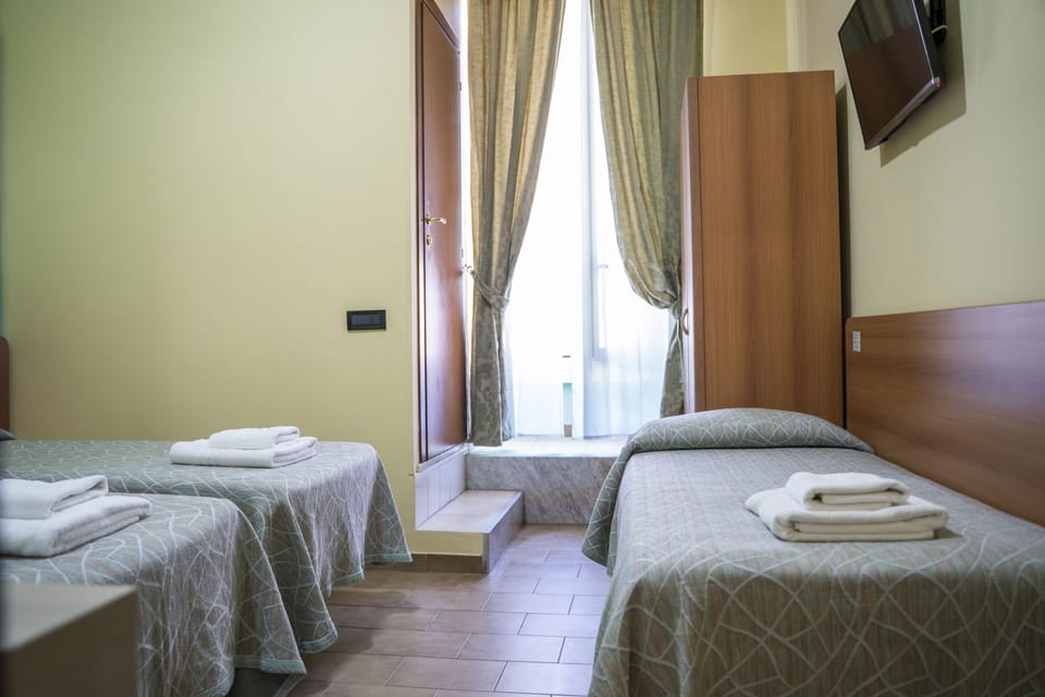 Hypo-allergenic bedding, minibar, in-room safe, desk