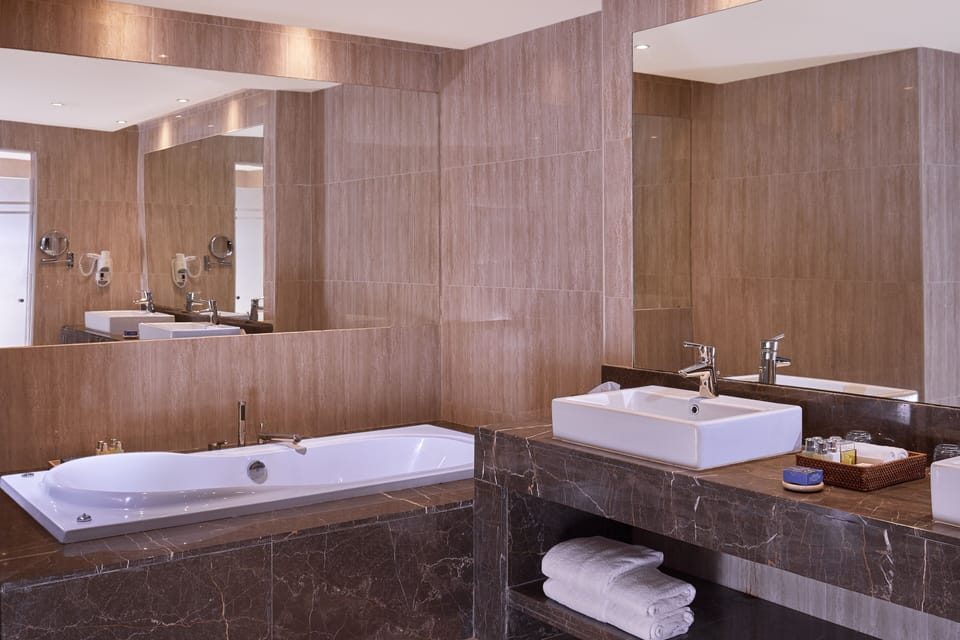 Royal Suite, 1 Queen Bed, Sea View | Bathroom | Jetted tub, eco-friendly toiletries, hair dryer, bathrobes