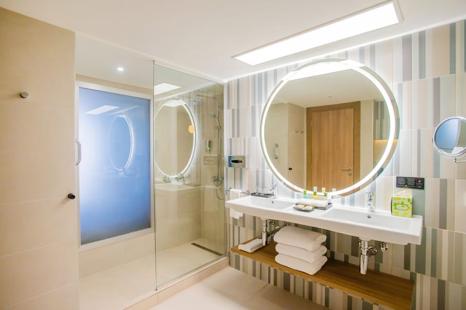 Shower, rainfall showerhead, eco-friendly toiletries, hair dryer