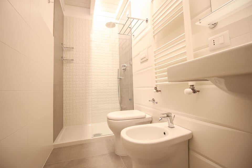 Luxury Suite, Multiple Bedrooms (Corte Fondaco) | Bathroom | Shower, free toiletries, hair dryer, slippers