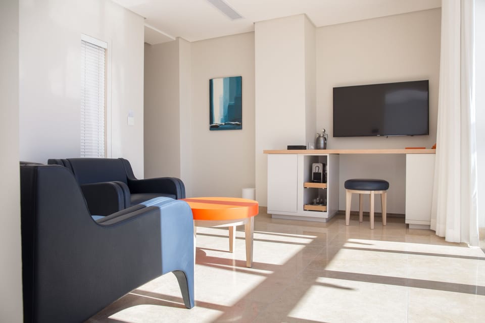 Suite - Sea View  | Living room | LED TV