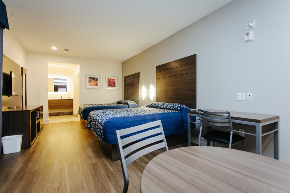 Standard Room, 2 Queen Beds, Non Smoking | Desk, iron/ironing board, free WiFi, bed sheets
