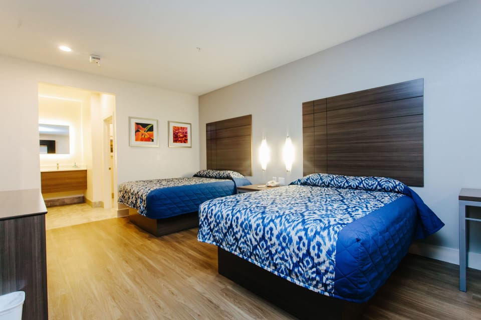 Standard Room, 2 Queen Beds, Non Smoking | Desk, iron/ironing board, free WiFi, bed sheets