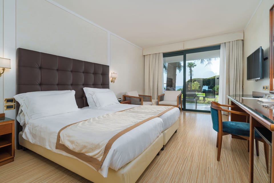 Superior Double Room, Lake View | Premium bedding, minibar, in-room safe, desk