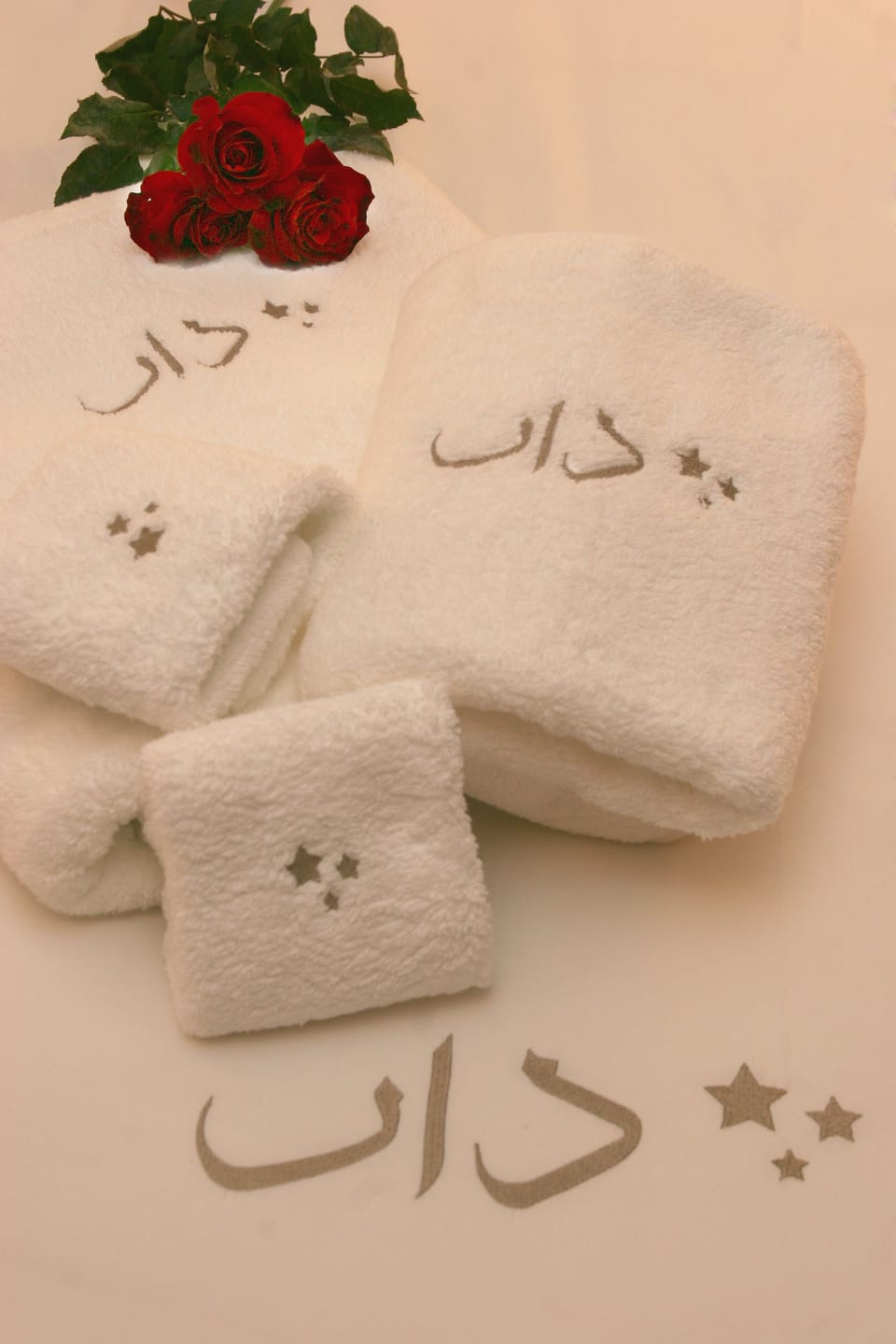 Designer toiletries, hair dryer, bathrobes, towels