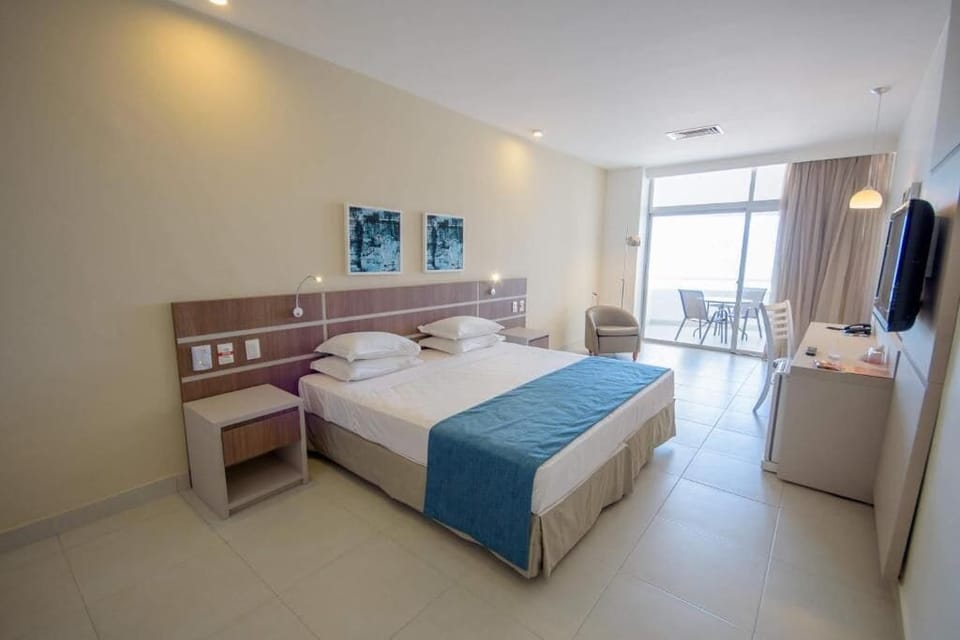Deluxe Double Room, Lanai, Sea Facing | Minibar, in-room safe, desk, blackout drapes