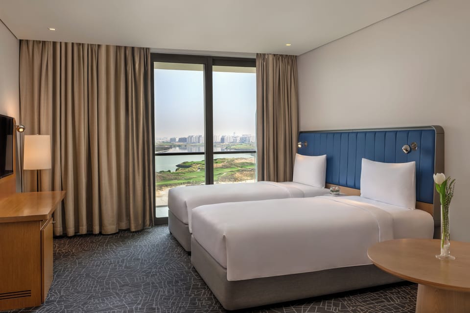 Suite, 2 Bedrooms, Balcony, Sea View (Theme Park Access) | Down comforters, Select Comfort beds, minibar, in-room safe