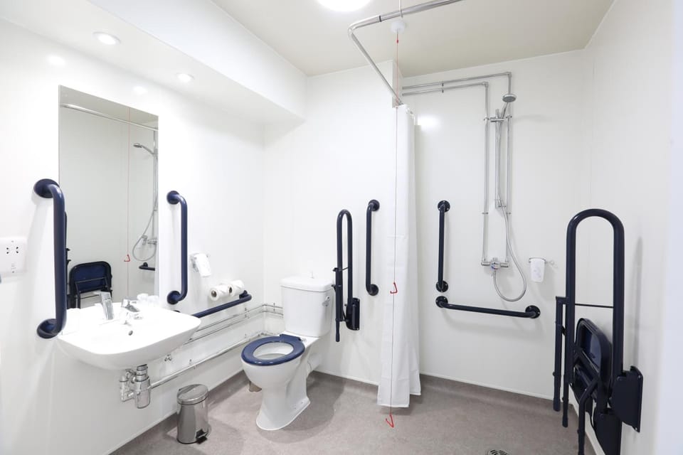 Double or Twin Room, Accessible | Bathroom | Shower, free toiletries, towels