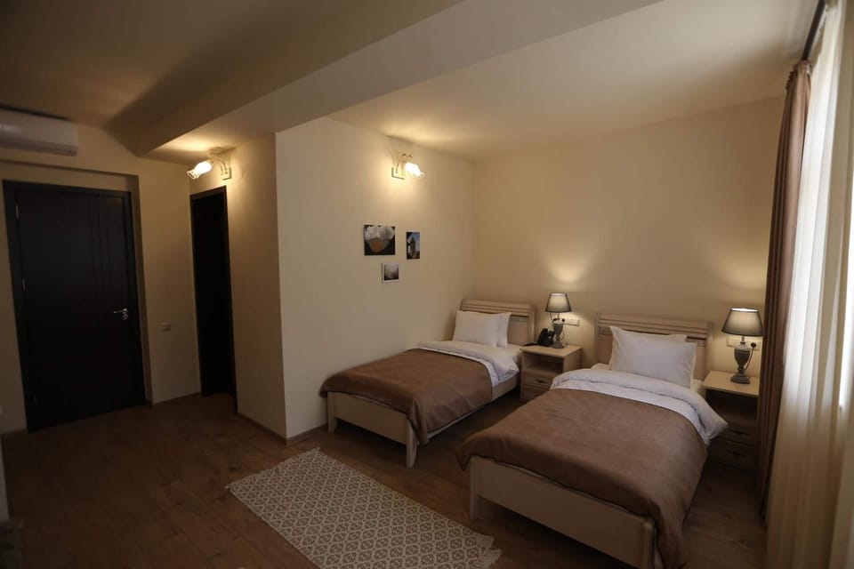 Standard Twin Room, Non Smoking | In-room safe, laptop workspace, blackout drapes, soundproofing