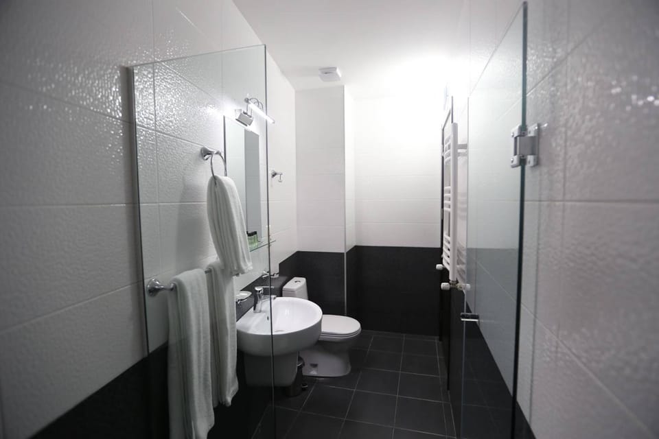 Shower, free toiletries, hair dryer, slippers