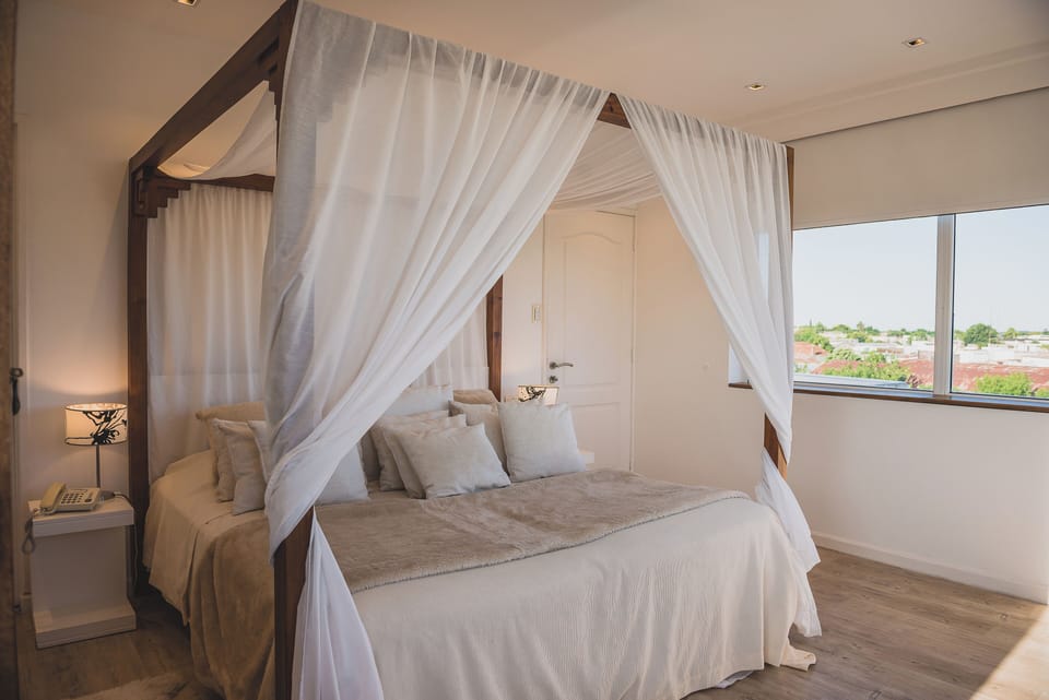 Suite | Premium bedding, minibar, in-room safe, individually decorated
