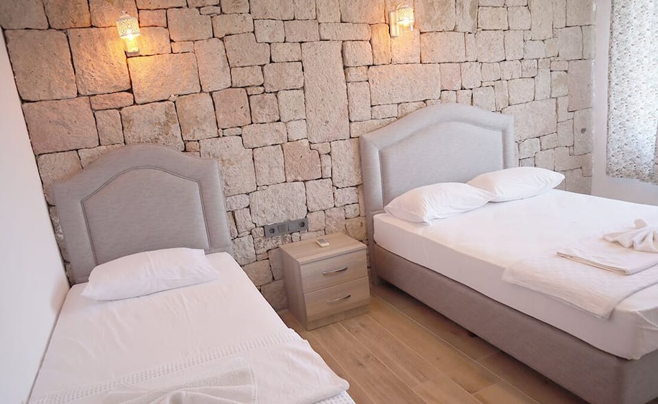 Triple Room, Lanai, Sea View | Free cribs/infant beds, bed sheets
