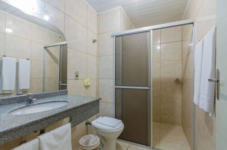 Shower, rainfall showerhead, designer toiletries, hair dryer