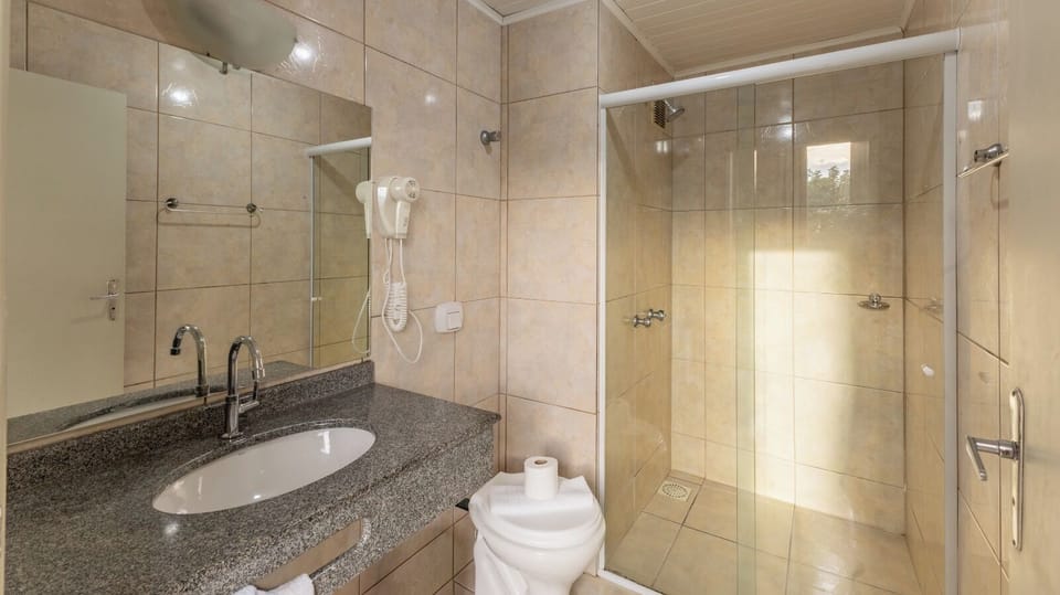 Shower, rainfall showerhead, designer toiletries, hair dryer