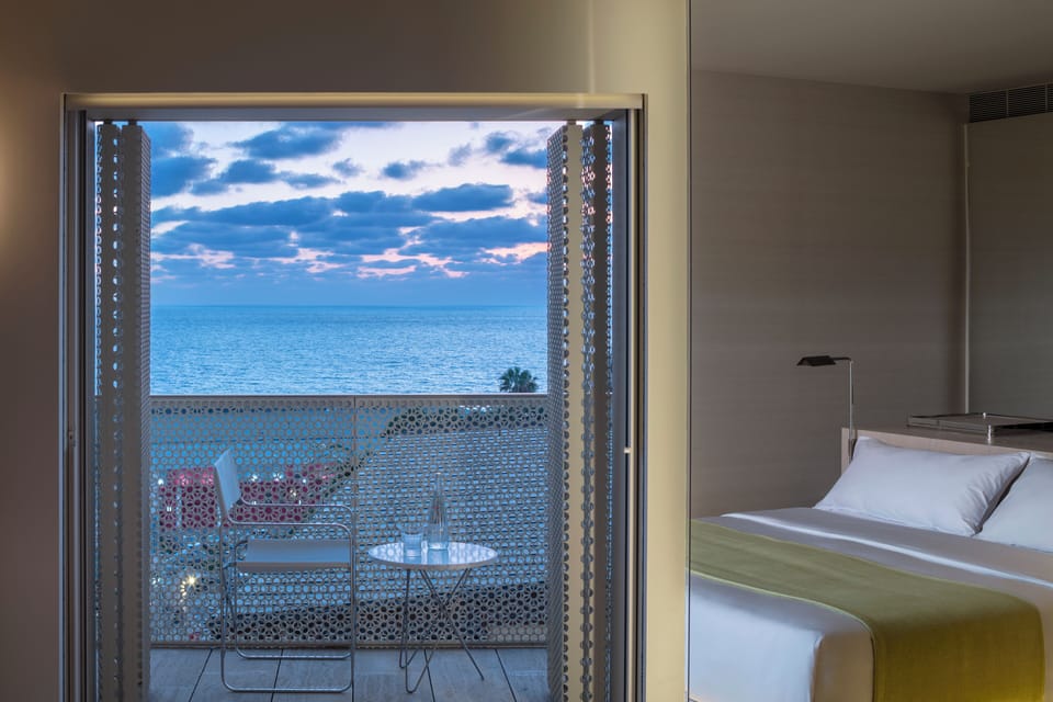 Deluxe Room, Balcony, Sea View | Pillowtop beds, minibar, in-room safe, individually furnished