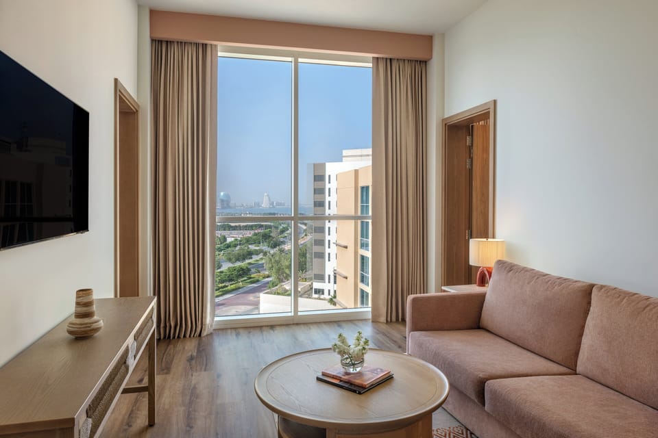 Suite, 2 Bedrooms, Accessible, Pool View | Down comforters, in-room safe, desk, blackout drapes
