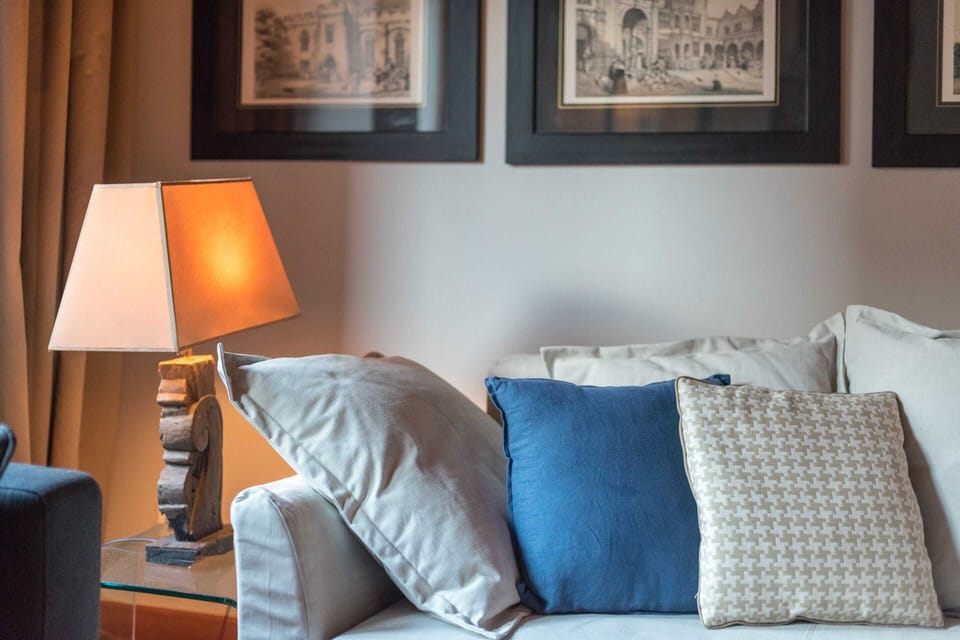 Deluxe Apartment, 2 Bedrooms, City View | Living room | Flat-screen TV, fireplace, iPod dock, MP3 dock