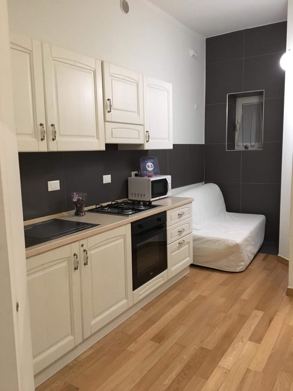 Fridge, microwave, stovetop, cookware/dishes/utensils