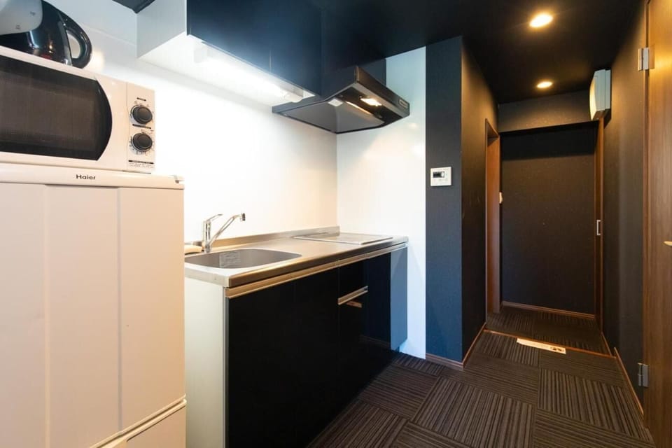 Apartment | Private kitchen | Fridge, microwave, stovetop, electric kettle