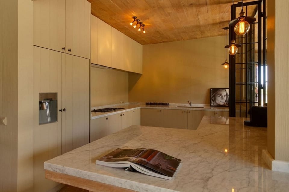 Villa, 5 Bedrooms | Private kitchen | Fridge, microwave, stovetop, coffee/tea maker