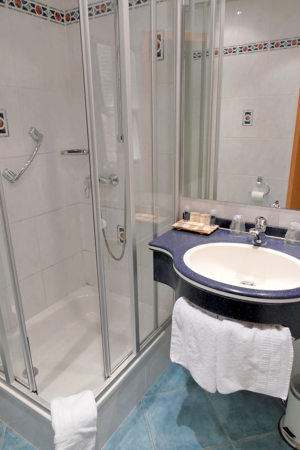 Shower, free toiletries, hair dryer, towels