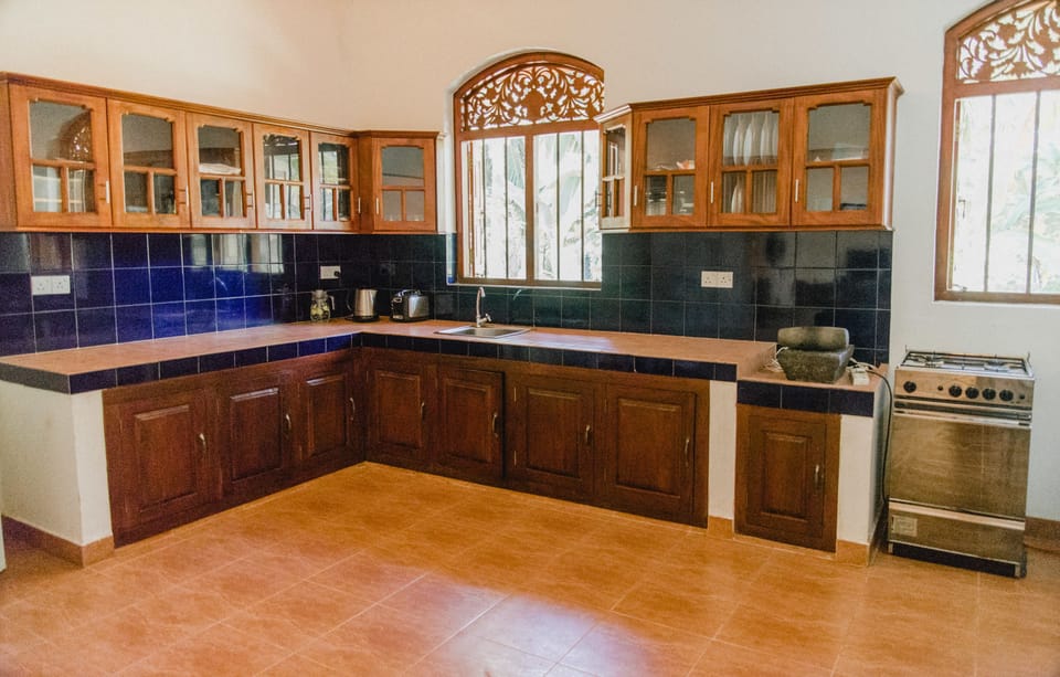 Private Villa | Private kitchen | Full-size fridge, oven, stovetop, coffee/tea maker