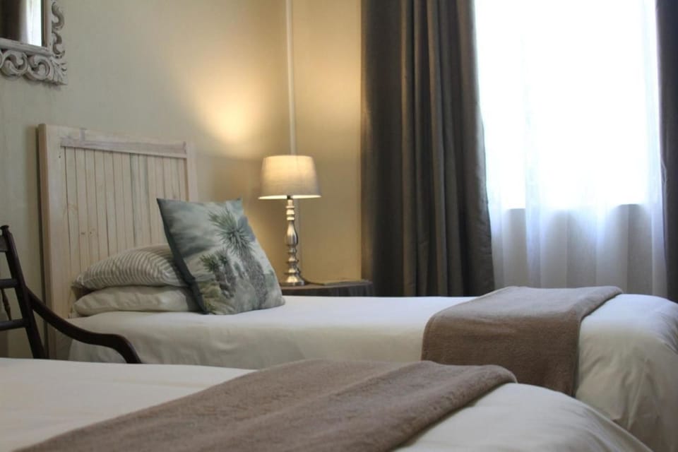 King/Twin En-Suite  | 1 bedroom, down comforters, individually decorated