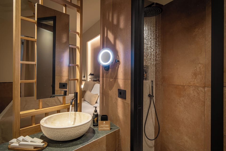 Signature Sea View Relaxation Overflow Heated Tub, Adults Only Complex | Bathroom | Shower, free toiletries, hair dryer, bathrobes